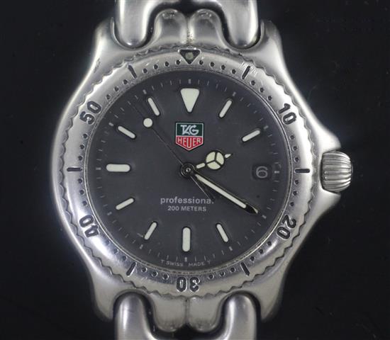 A gentlemans stainless steel Tag Heuer Precision 200 Meters quartz wrist watch, black dial,